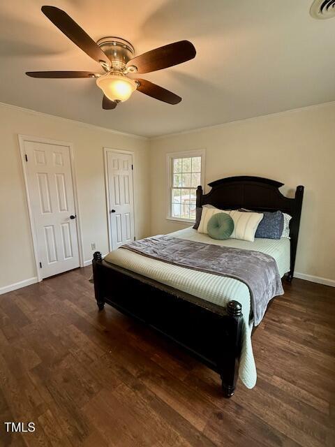 138 Dorsey Pl, Henderson, NC 27536 - bedroom featuring ornamental molding, dark wood-style flooring, and ceiling fan