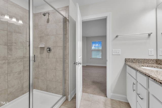 2849 Dallas Valley Ln, Apex, NC 27502 - full bathroom featuring vanity, a shower stall, and tile patterned floors