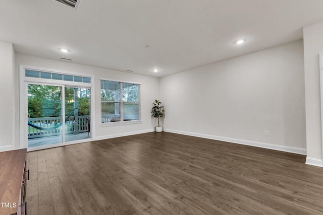 2849 Dallas Valley Ln, Apex, NC 27502 - spare room featuring dark wood-style floors and recessed lighting