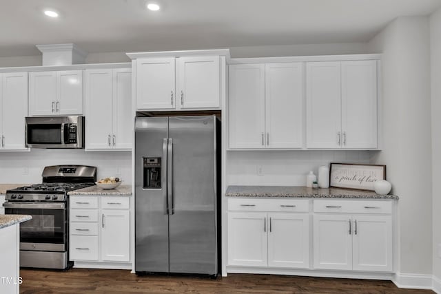 2849 Dallas Valley Ln, Apex, NC 27502 - kitchen featuring stainless steel appliances, white cabinetry, decorative backsplash, and recessed lighting