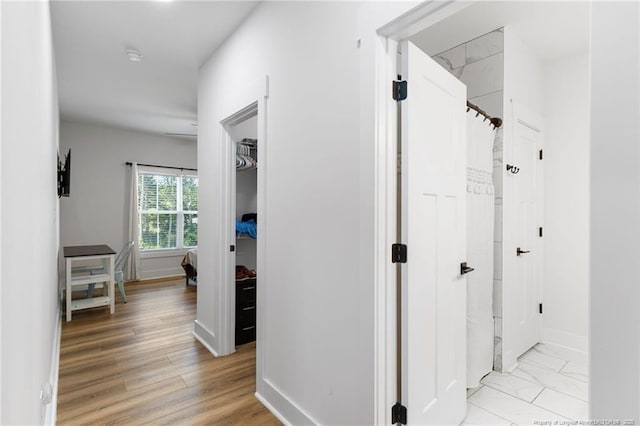 412 Stable Ct, Linden, NC 28356 - corridor featuring baseboards and light wood-style floors