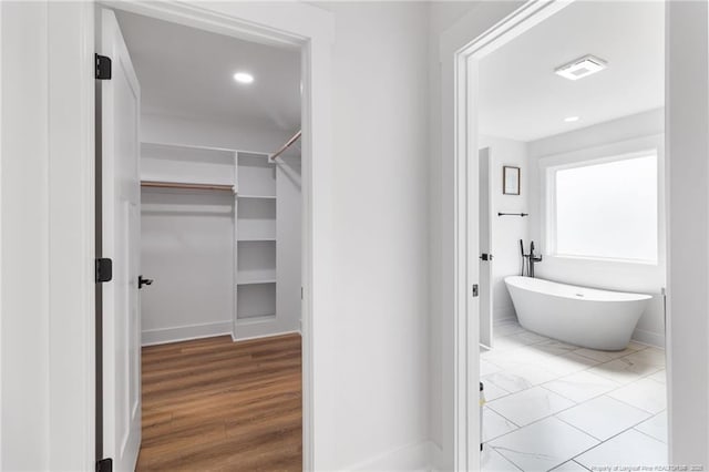 412 Stable Ct, Linden, NC 28356 - spacious closet featuring wood finished floors