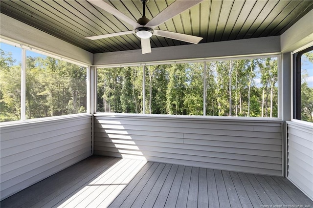 412 Stable Ct, Linden, NC 28356 - wooden deck with a ceiling fan and view of wooded area