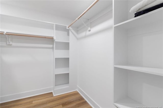 412 Stable Ct, Linden, NC 28356 - spacious closet featuring wood finished floors