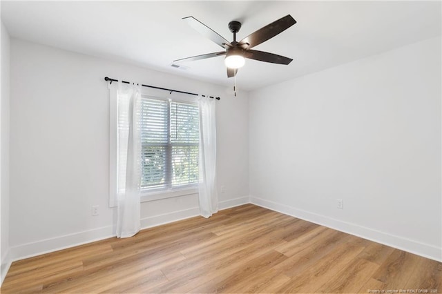 412 Stable Ct, Linden, NC 28356 - empty room with light wood-type flooring and ceiling fan
