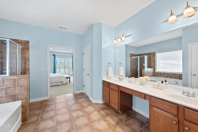 308 Minton Valley Ln, Cary, NC 27519 - bathroom with a stall shower, a garden tub, double vanity, and ensuite bath