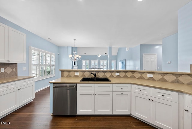 308 Minton Valley Ln, Cary, NC 27519 - kitchen featuring stainless steel dishwasher, tasteful backsplash, light countertops, and white cabinets