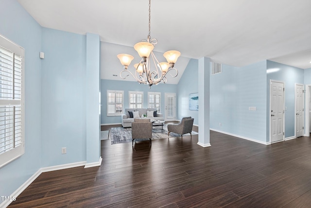 308 Minton Valley Ln, Cary, NC 27519 - dining room with a chandelier, dark wood finished floors, and lofted ceiling