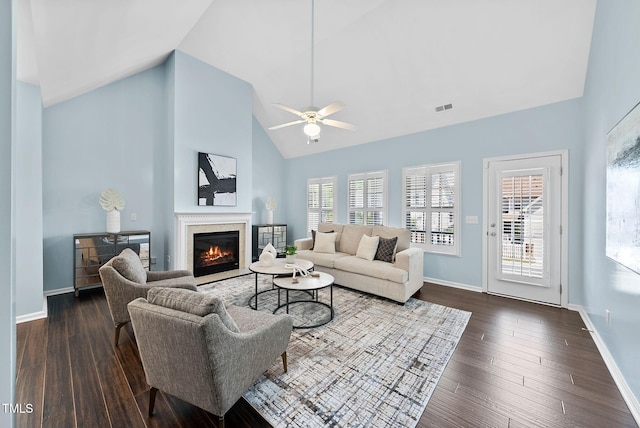 308 Minton Valley Ln, Cary, NC 27519 - living area with a glass covered fireplace, dark wood-style floors, high vaulted ceiling, and ceiling fan