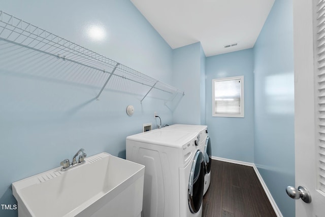 308 Minton Valley Ln, Cary, NC 27519 - laundry room featuring washer and dryer and dark wood finished floors