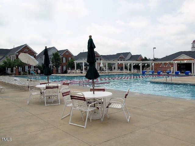 308 Minton Valley Ln, Cary, NC 27519 - community pool featuring a patio area