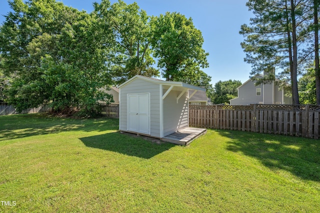 10 N Berrymeadow Ln, Durham, NC 27703 - fenced backyard featuring a storage unit