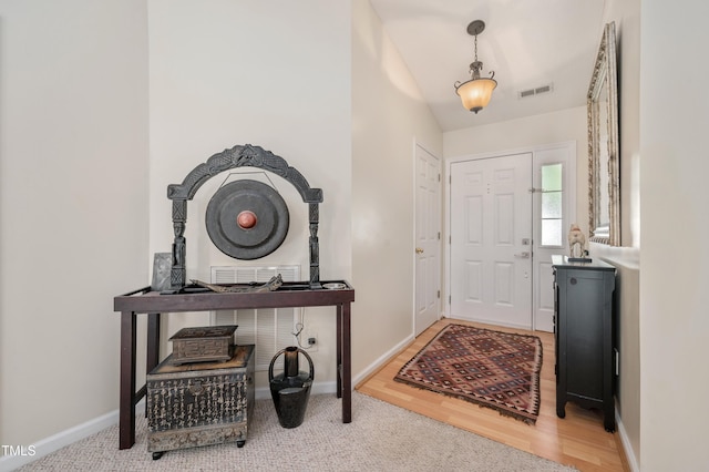 10 N Berrymeadow Ln, Durham, NC 27703 - entrance foyer with baseboards and wood finished floors