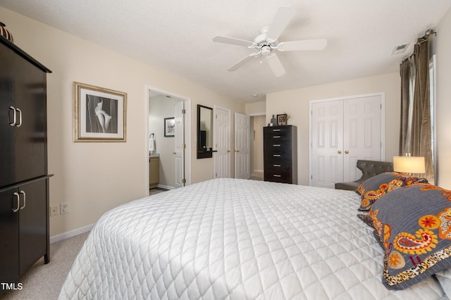 10 N Berrymeadow Ln, Durham, NC 27703 - bedroom featuring light colored carpet, a closet, a ceiling fan, and connected bathroom