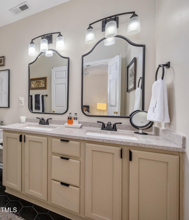 10 N Berrymeadow Ln, Durham, NC 27703 - full bathroom with double vanity and tile patterned floors