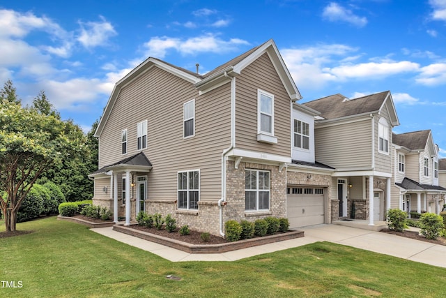 2801 Casona Way, Raleigh, NC 27616 - view of front of house with driveway, a garage, a front yard, and brick siding