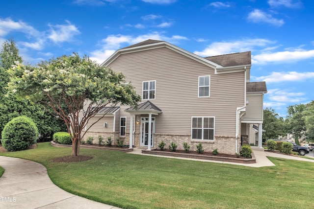 2801 Casona Way, Raleigh, NC 27616 - view of front of house featuring brick siding, a front yard, and a shingled roof
