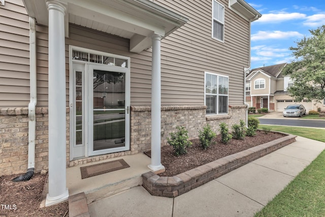 2801 Casona Way, Raleigh, NC 27616 - doorway to property with brick siding