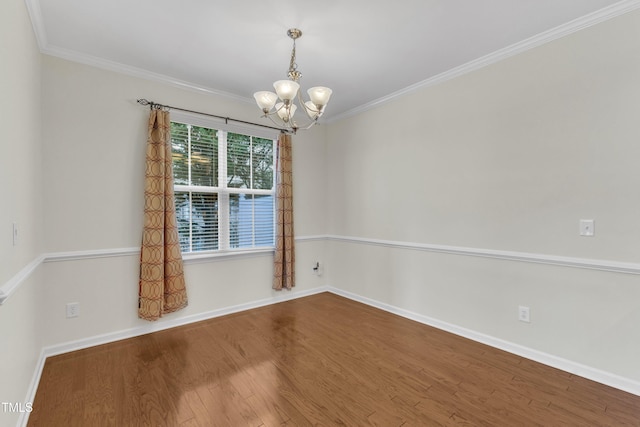 2801 Casona Way, Raleigh, NC 27616 - empty room with a chandelier, wood finished floors, and crown molding