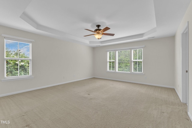 2801 Casona Way, Raleigh, NC 27616 - unfurnished room featuring a raised ceiling and light colored carpet