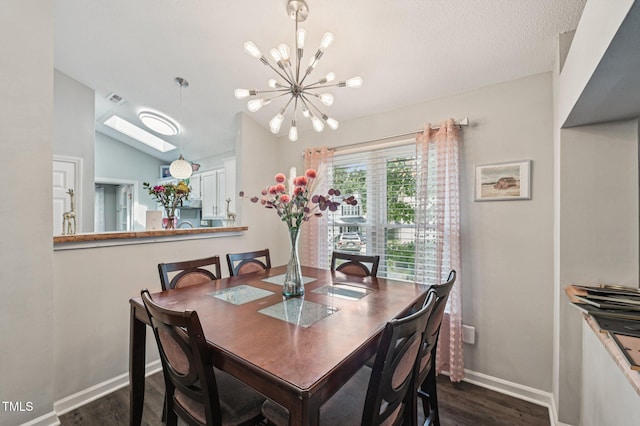 307 Wax Myrtle Ct, Cary, NC 27513 - dining area with a chandelier, dark wood finished floors, and lofted ceiling