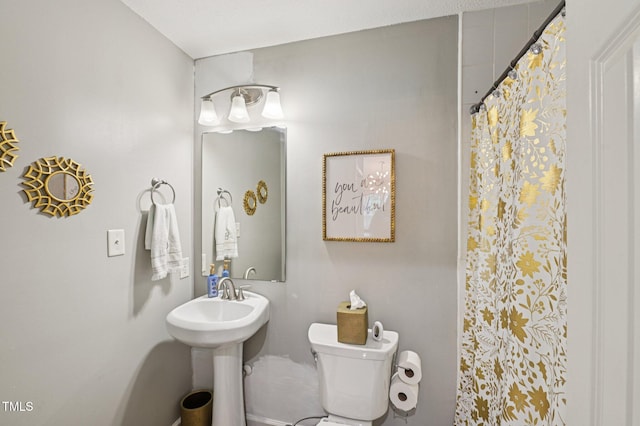 307 Wax Myrtle Ct, Cary, NC 27513 - bathroom featuring toilet and curtained shower