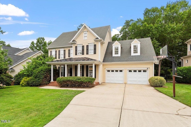5001 Sears Farm Rd, Cary, NC 27519 - traditional home featuring covered porch, concrete driveway, a front yard, and roof with shingles