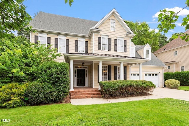 5001 Sears Farm Rd, Cary, NC 27519 - view of front of home featuring driveway, covered porch, a front yard, and a garage
