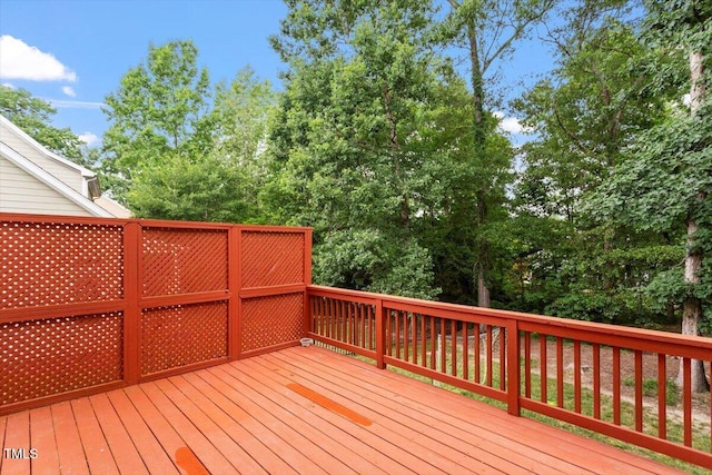 5001 Sears Farm Rd, Cary, NC 27519 - wooden deck featuring view of scattered trees