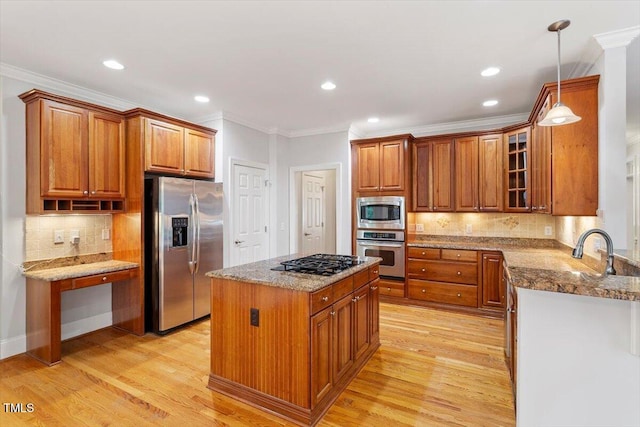 5001 Sears Farm Rd, Cary, NC 27519 - kitchen with appliances with stainless steel finishes, stone counters, brown cabinets, crown molding, and recessed lighting