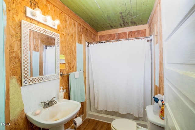 7167 Adolph Rd, Bailey, NC 27807 - bathroom featuring wood finished floors, wooden ceiling, and shower / bath combo with shower curtain