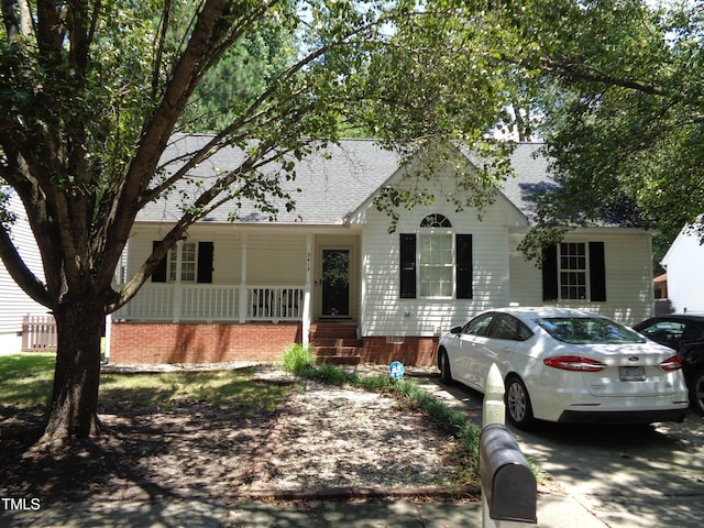 3419 Streams Of Fields Dr, Raleigh, NC 27604 - view of front of house with a shingled roof and a porch