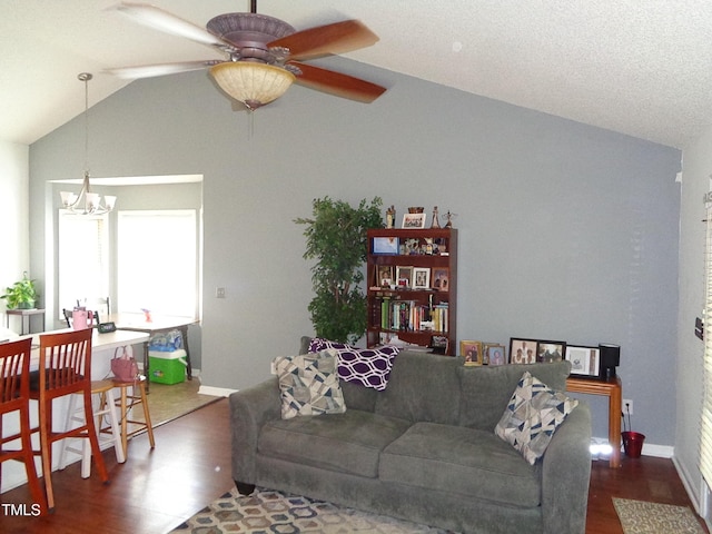 3419 Streams Of Fields Dr, Raleigh, NC 27604 - living area featuring lofted ceiling, wood finished floors, a chandelier, and ceiling fan