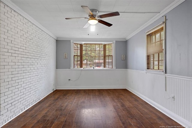 4209 Coventry Rd, Fayetteville, NC 28304 - empty room with brick wall, plenty of natural light, ceiling fan, hardwood / wood-style flooring, and ornamental molding