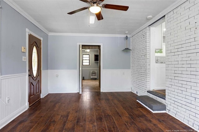 4209 Coventry Rd, Fayetteville, NC 28304 - foyer entrance featuring a ceiling fan, wainscoting, wood-type flooring, and ornamental molding
