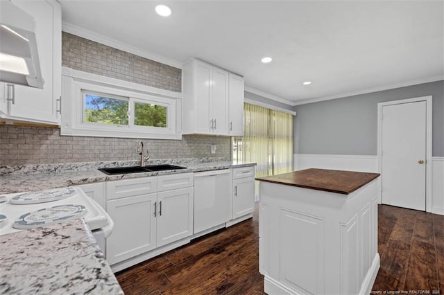 4209 Coventry Rd, Fayetteville, NC 28304 - kitchen with white appliances, plenty of natural light, crown molding, dark wood-style flooring, and recessed lighting