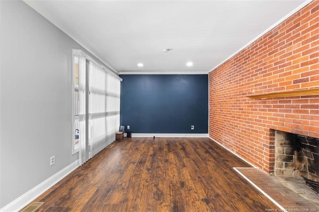 4209 Coventry Rd, Fayetteville, NC 28304 - unfurnished living room featuring ornamental molding, a fireplace, wood finished floors, and recessed lighting