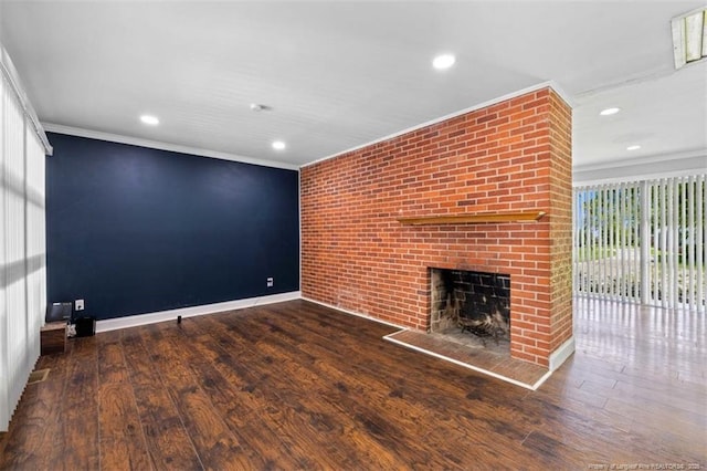 4209 Coventry Rd, Fayetteville, NC 28304 - unfurnished living room with a fireplace, crown molding, recessed lighting, and wood finished floors