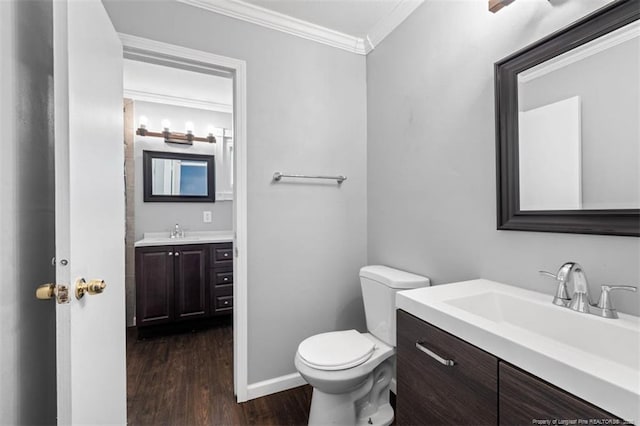 4209 Coventry Rd, Fayetteville, NC 28304 - bathroom with crown molding, vanity, and wood finished floors