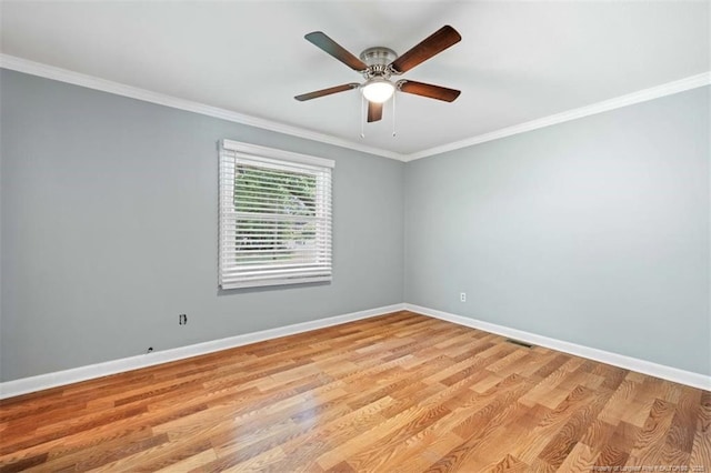 4209 Coventry Rd, Fayetteville, NC 28304 - spare room with crown molding, light wood-style floors, and ceiling fan