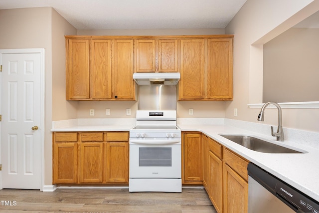 424 Nomar, Raleigh, NC 27610 - kitchen with white range with electric stovetop, dishwasher, under cabinet range hood, light wood-style flooring, and light countertops