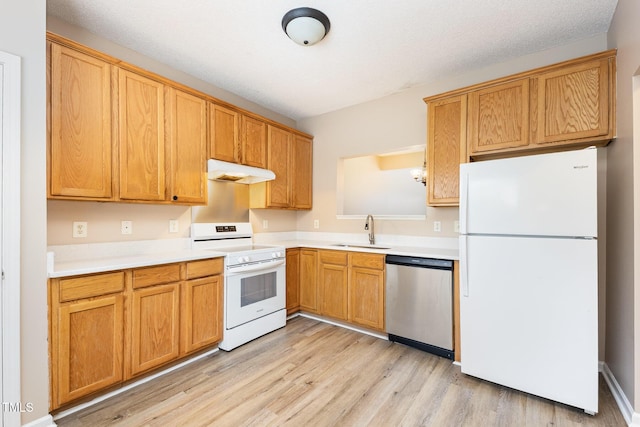 424 Nomar, Raleigh, NC 27610 - kitchen featuring white appliances, under cabinet range hood, light wood-style floors, and light countertops