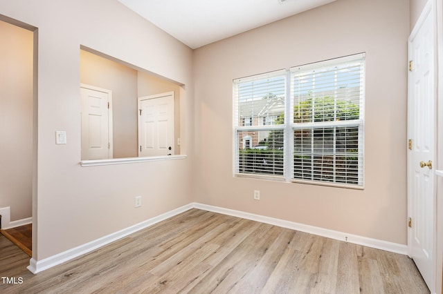 424 Nomar, Raleigh, NC 27610 - spare room with wood finished floors and baseboards
