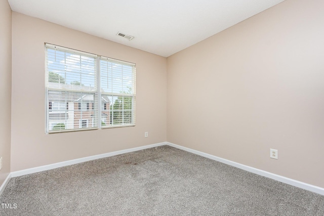 424 Nomar, Raleigh, NC 27610 - carpeted spare room with baseboards