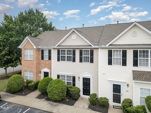 424 Nomar, Raleigh, NC 27610 - townhome / multi-family property with roof with shingles