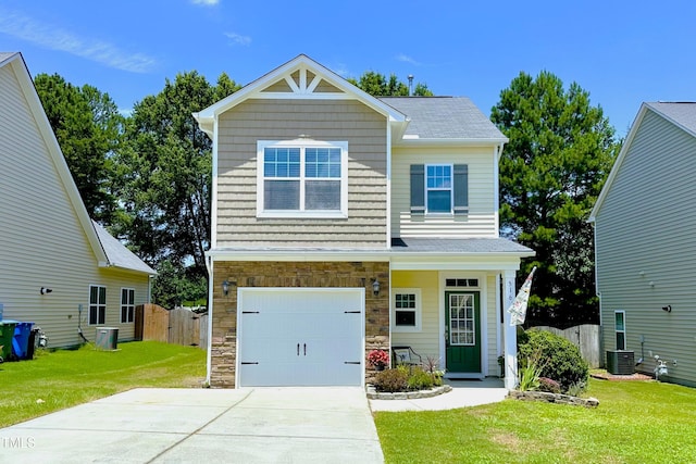 516 Smithridge Way, Fuquay Varina, NC 27526 - craftsman inspired home featuring an attached garage, stone siding, concrete driveway, and a shingled roof