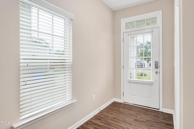 516 Smithridge Way, Fuquay Varina, NC 27526 - doorway to outside featuring dark wood-style floors and baseboards