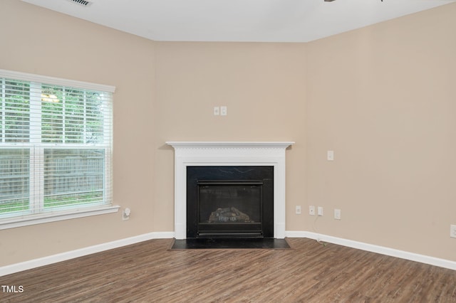 516 Smithridge Way, Fuquay Varina, NC 27526 - detailed view of wood finished floors and a fireplace with flush hearth