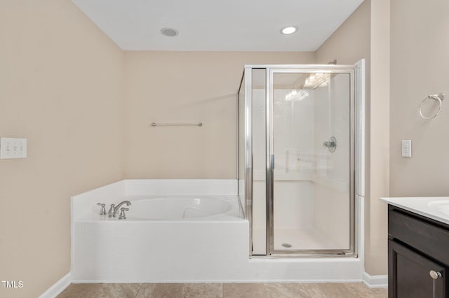 516 Smithridge Way, Fuquay Varina, NC 27526 - full bathroom featuring a shower stall, vanity, a bath, and tile patterned flooring