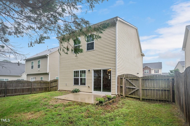 516 Smithridge Way, Fuquay Varina, NC 27526 - rear view of property featuring a patio area, a fenced backyard, and a gate